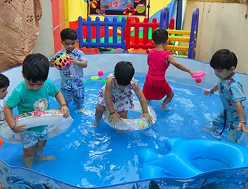 Play Group children enjoying water play